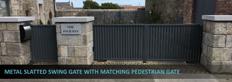 Metal slatted swing gates with matching pedestrian gate